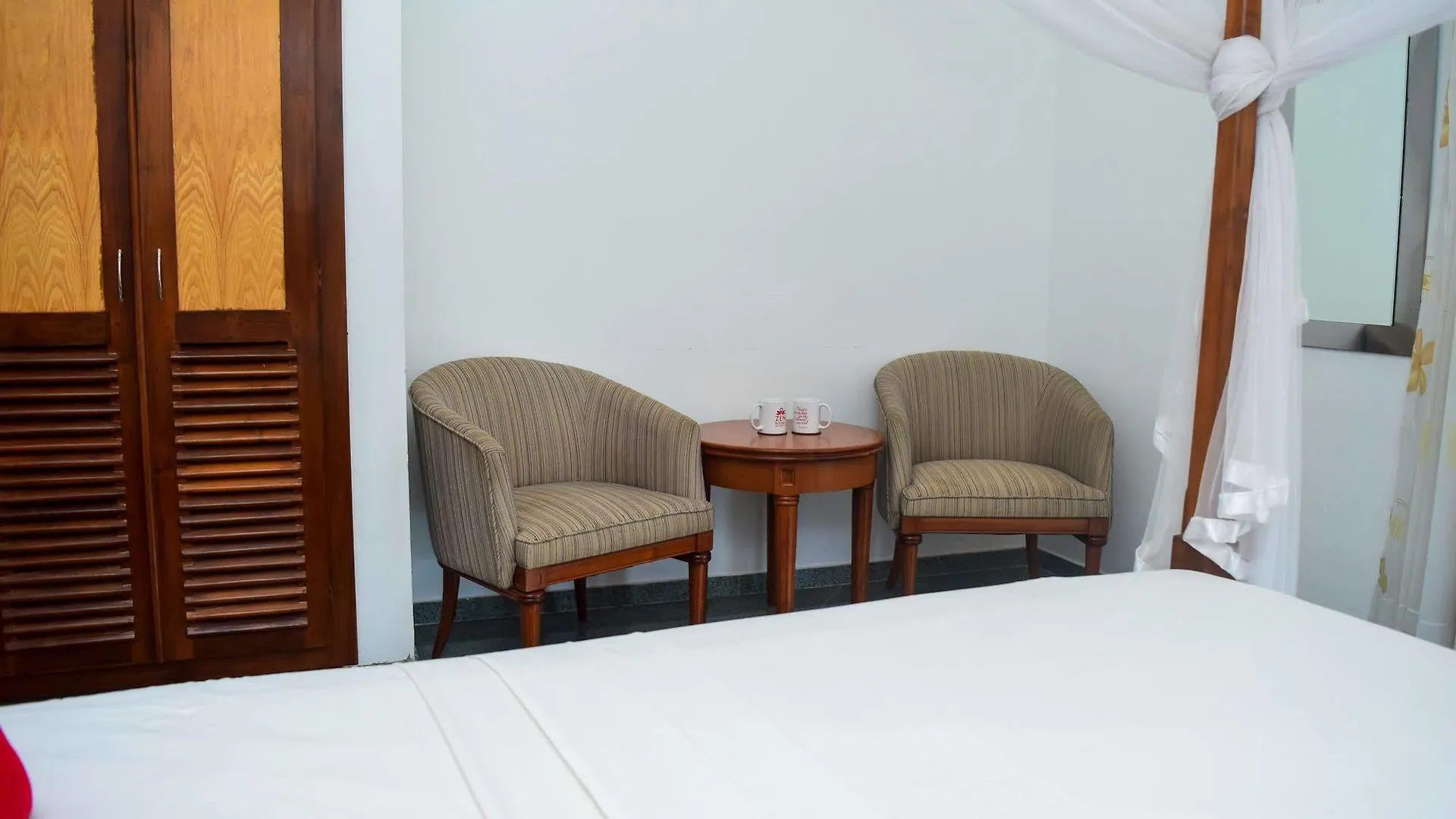 호텔 Zen Rooms Park Lane 니곰보